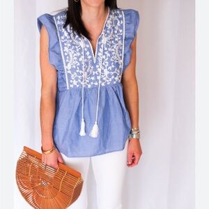 Buddy Basics light blue peasant top with white embroidery on the front and